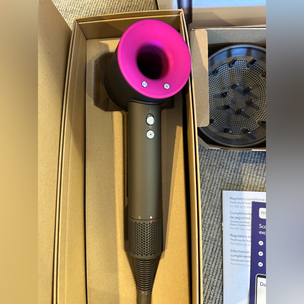 New Dyson Supersonic Hair Dryer with all the attachments.